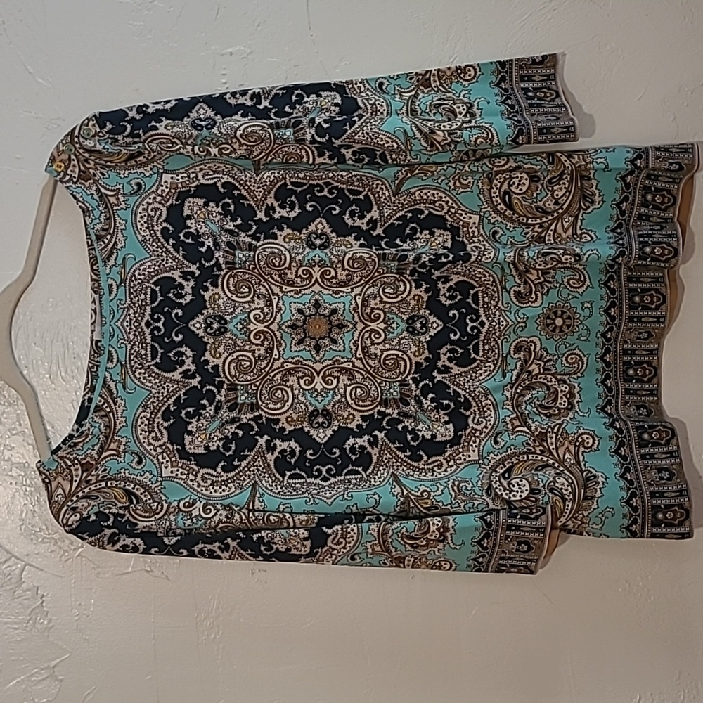A paisley mint green and navy blue shirt with 3/4 sleeves